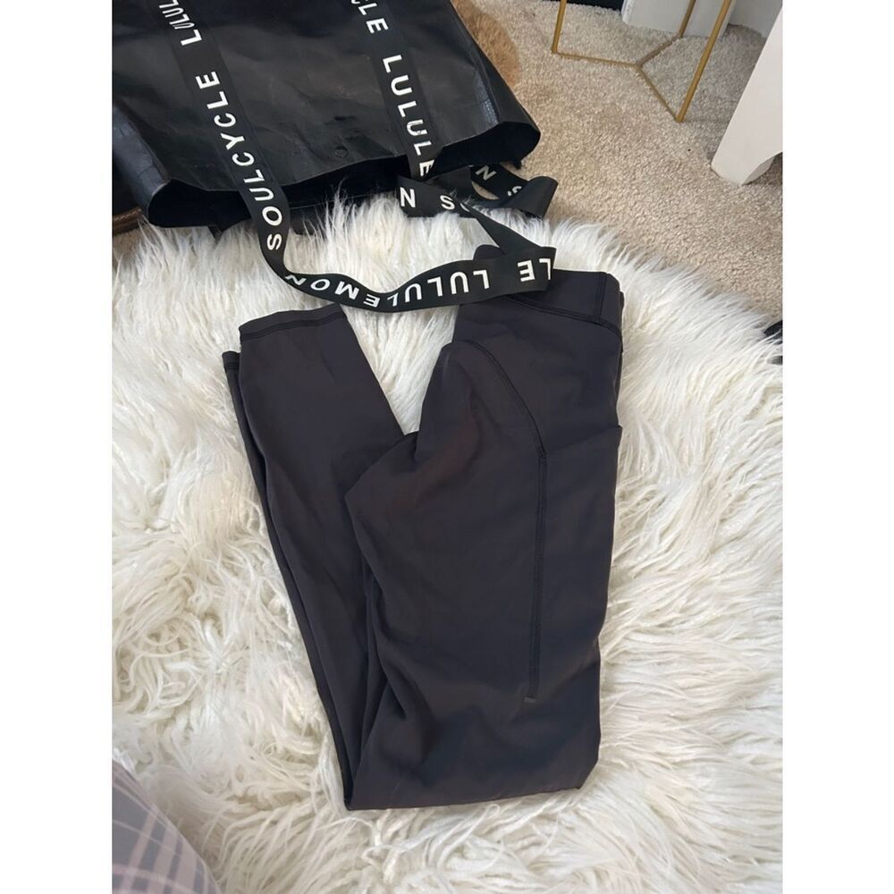 Lululemon Black Active Leggings size 4 good preowned condition no signs of wear